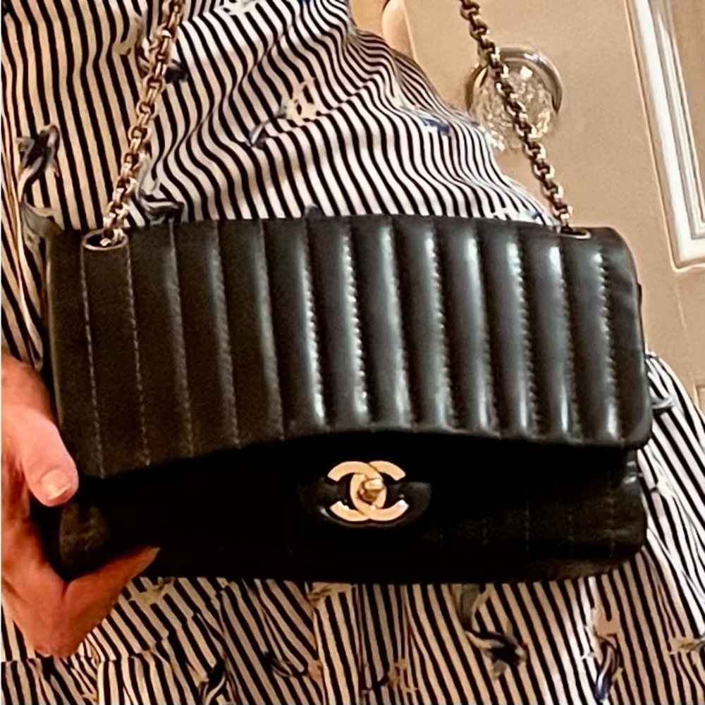 Chanel black Vertical quilt flap bag Silver hardware